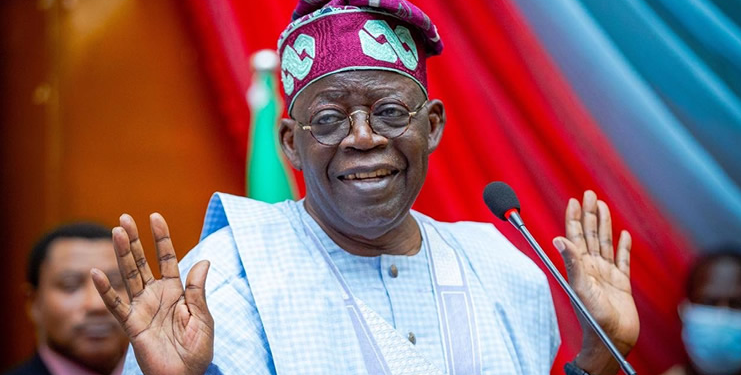 Sign of resignation: Tinubu raised two hands up.