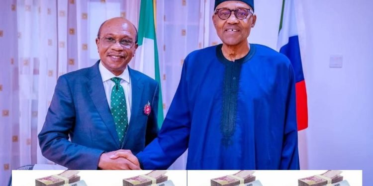 Nigeria's Central Bank governor, Godwin Emefiele in an handshake with President Muhammadu Buhari with Nigeria's new currency notes in front of them.