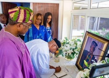 Dapo Abiodun signing condolence register at Chief Chris Ogunbanjo family house.