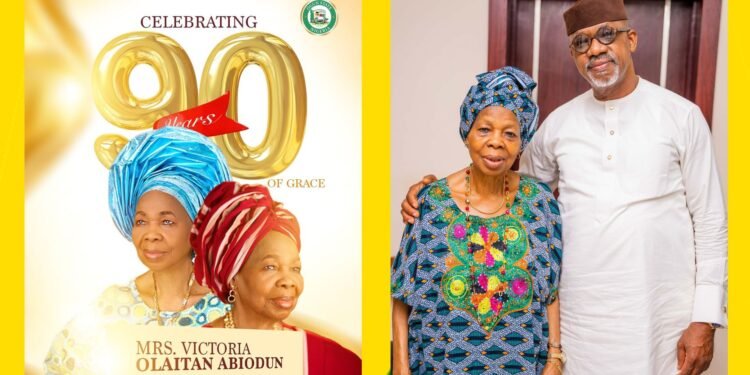 Ogun State Governor Dapo Abiodun with his mother, Mrs. Victoria Olaitan Abiodun, celebrating her 90th birthday surrounded by family and well-wishers.